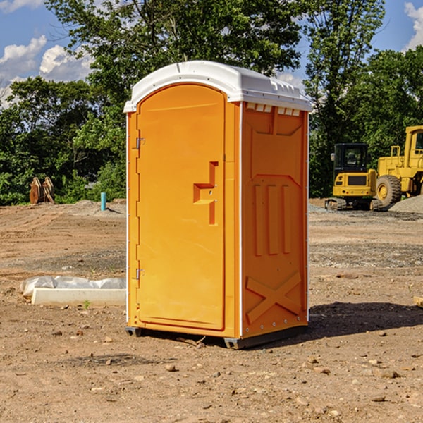 how often are the portable restrooms cleaned and serviced during a rental period in Gauley Bridge